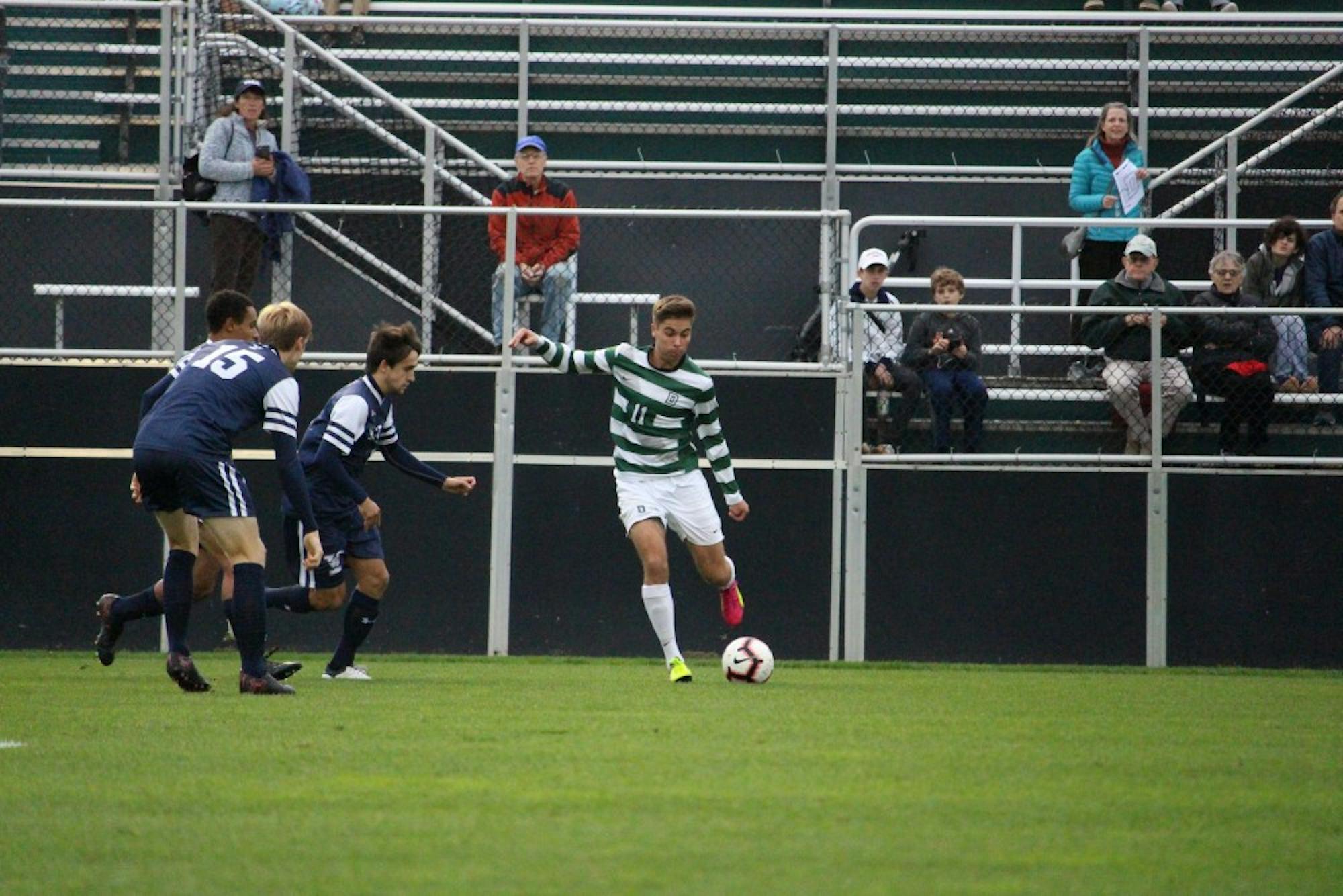 Dawson McCartney ’21, one of the Big Green’s leading offensive weapons, winds up to kick the ball against Yale University.