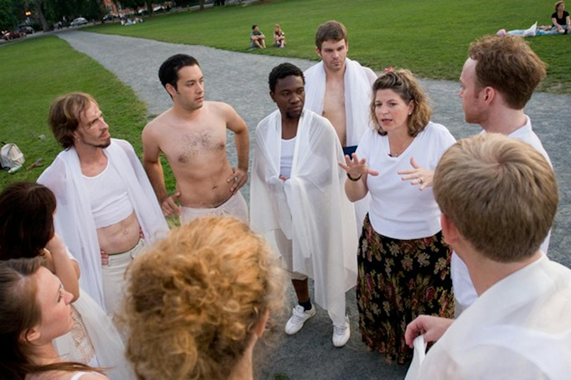 Northern Stage founder and artistic director Brooke Ciardelli talks to Dartmouth students and international actors during a dress rehearsal.