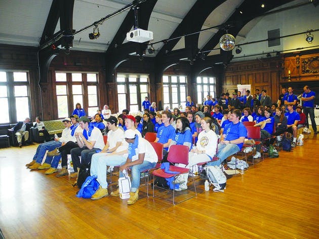 Students gather in Collis Common Ground for the opening of Day of Caring.