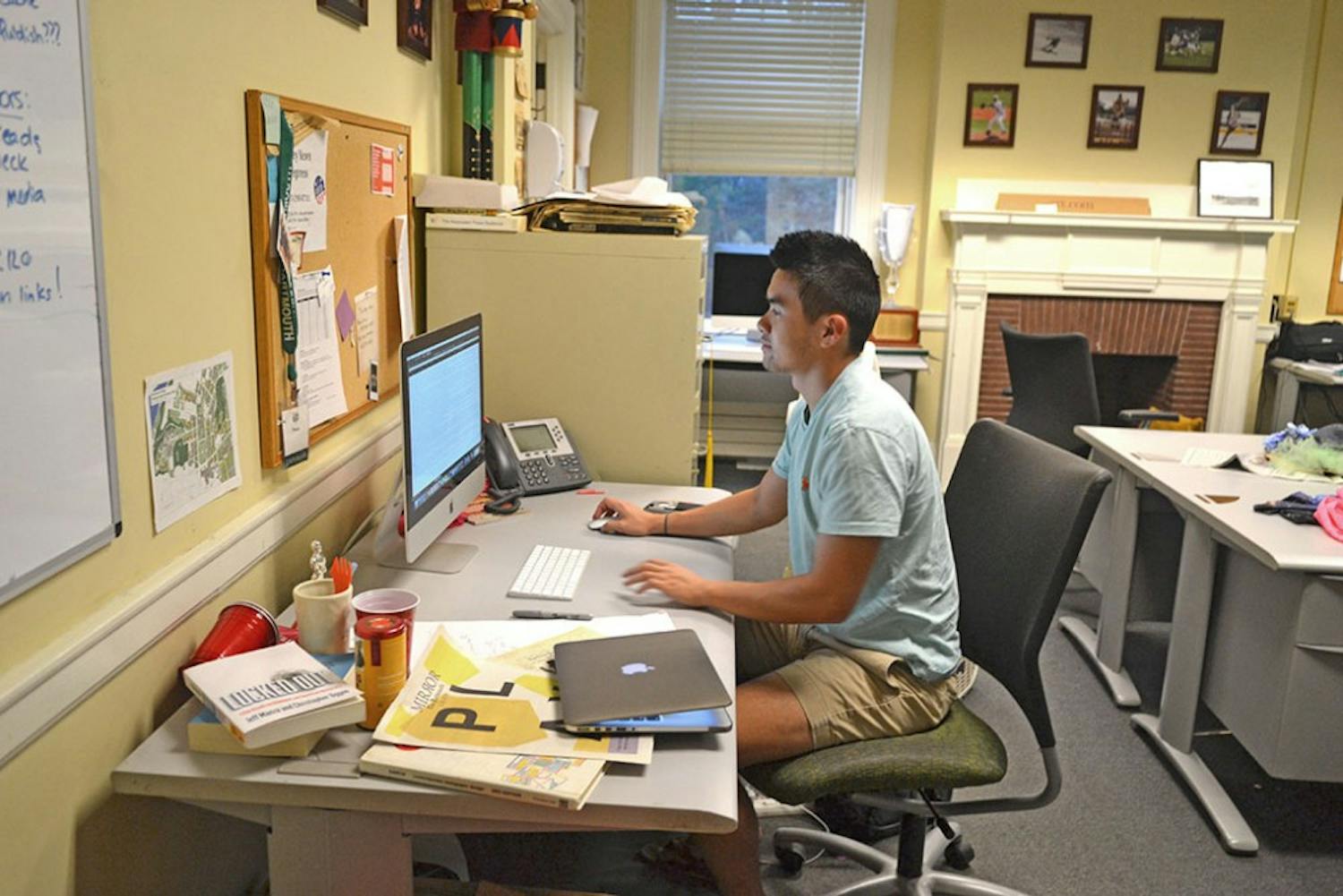 Ray Lu '18 works on a computer at The D's office.
