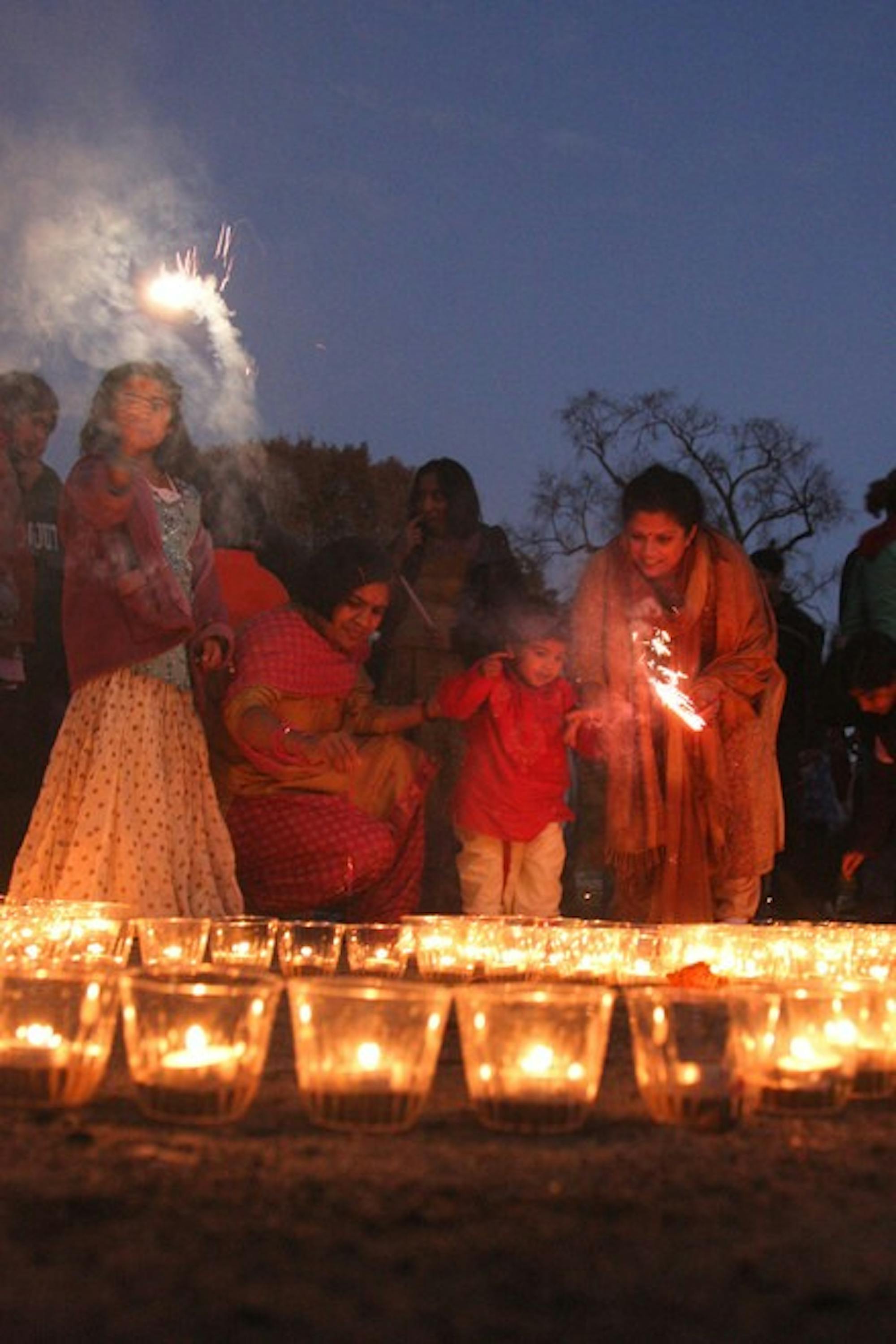 Community members celebrate Diwali on the Green Sunday evening.