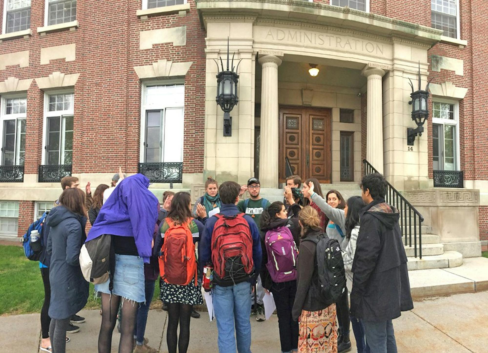 Divest Dartmouth members and other students gather outside of Parkhurst Hall before College President Phil Hanlon's open office hours.