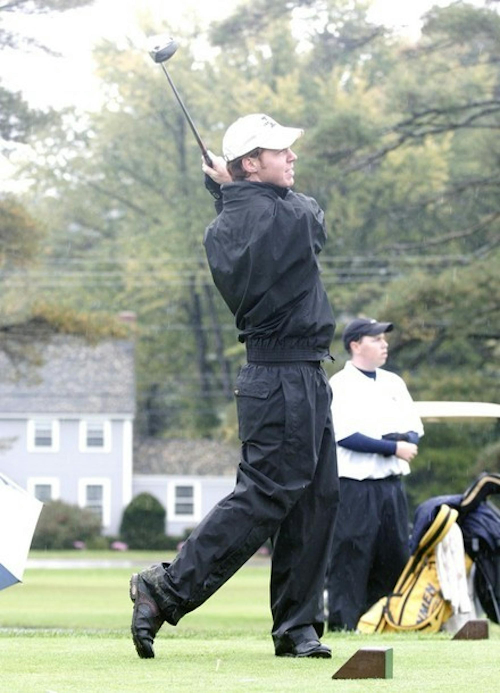 Jamie Wallace '08 keeps an eye on a drive at this weekend's Dartmouth Invitational. The team opened with a weak first round and finished third.