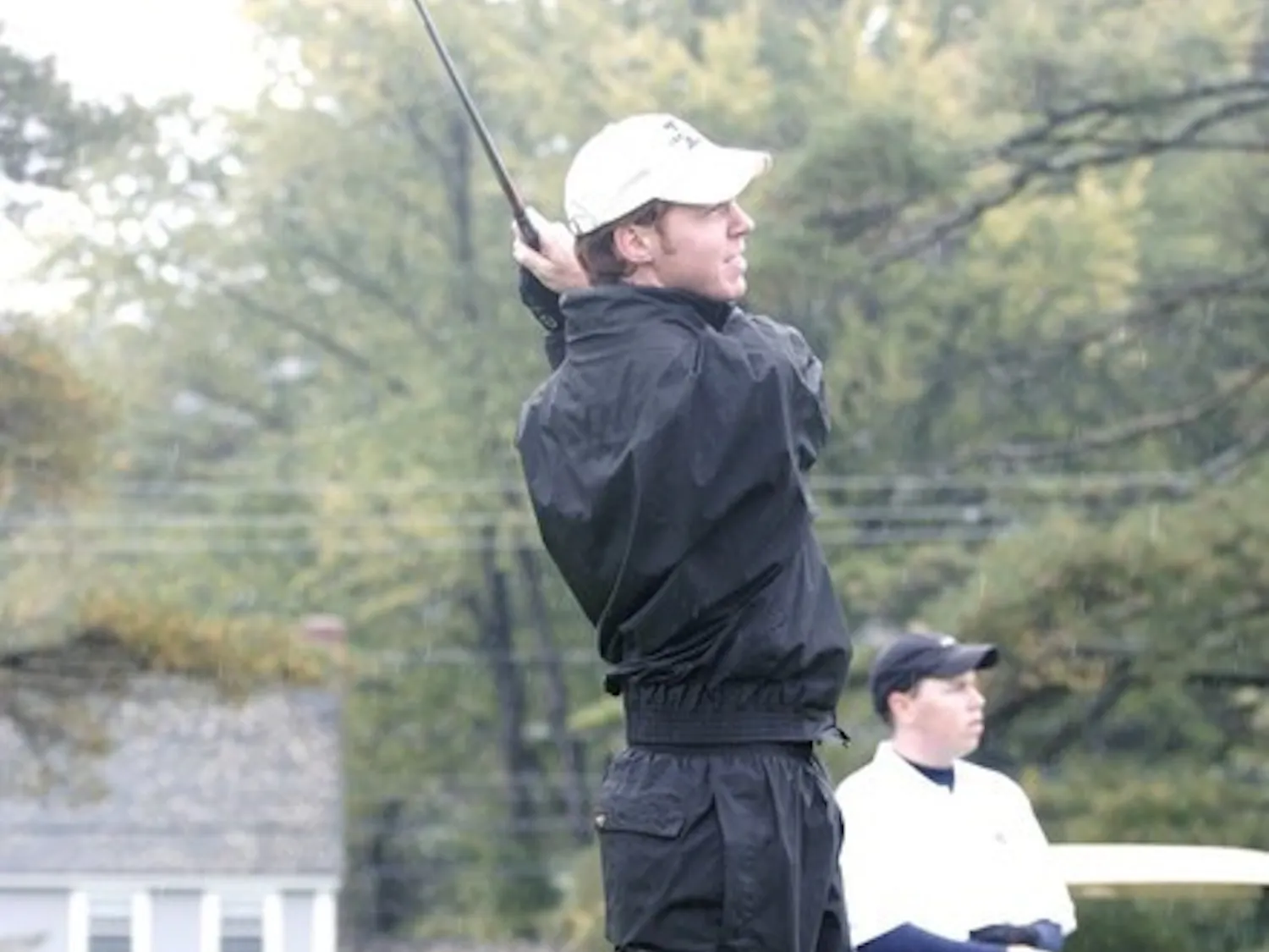 Jamie Wallace '08 keeps an eye on a drive at this weekend's Dartmouth Invitational. The team opened with a weak first round and finished third.