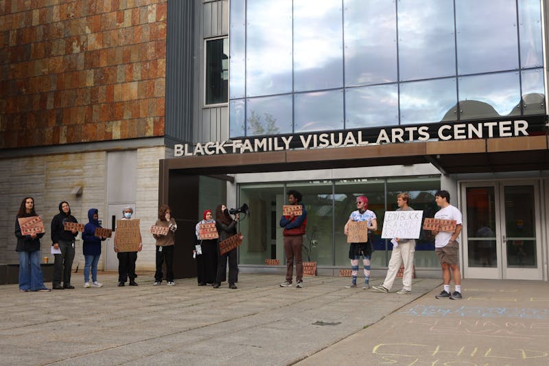 Students rally outside BVAC, call for College to rename building