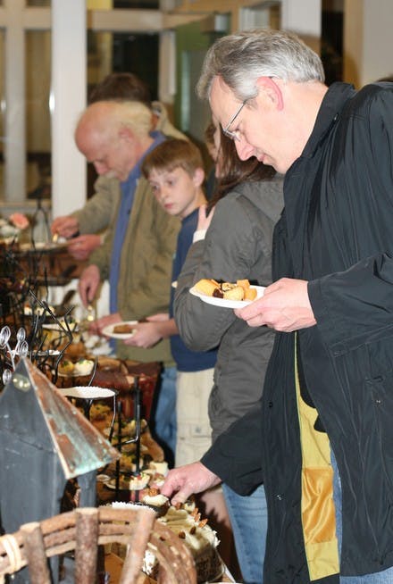 Parents and visitors attend a reception for First Year Family weekend.