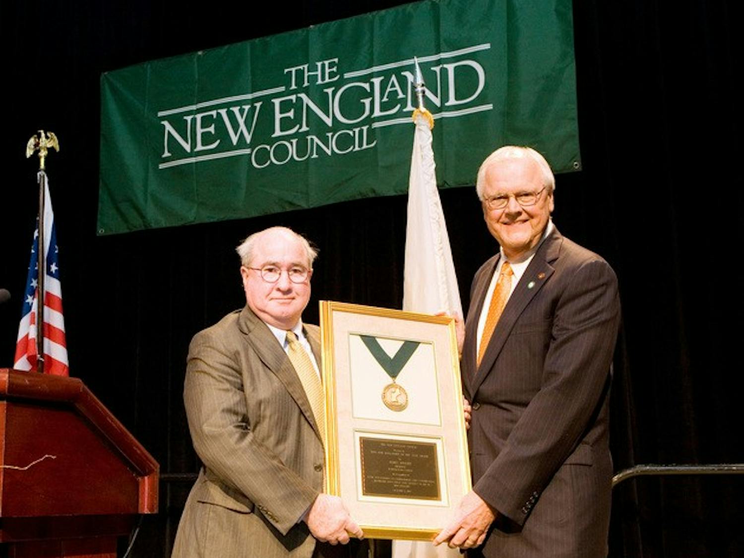 College President James Wright received a New Englander of the Year award last night for his efforts to help send wounded veterans to college.