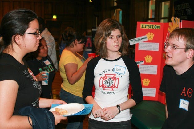 Members of Greek organizations speak to potential new members on Thurs.