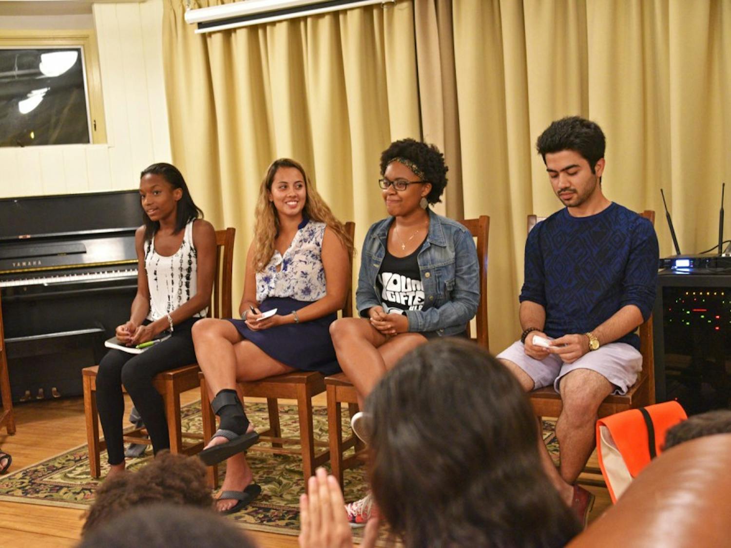 Four panelists speak on a Tuesday panel about race in the Greek system as part of the “VoX: Voices of Summer.”