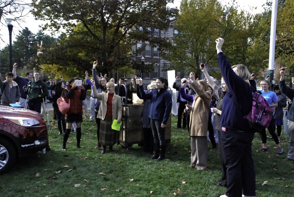 Community members gathered on the Green Monday to savor local apples.