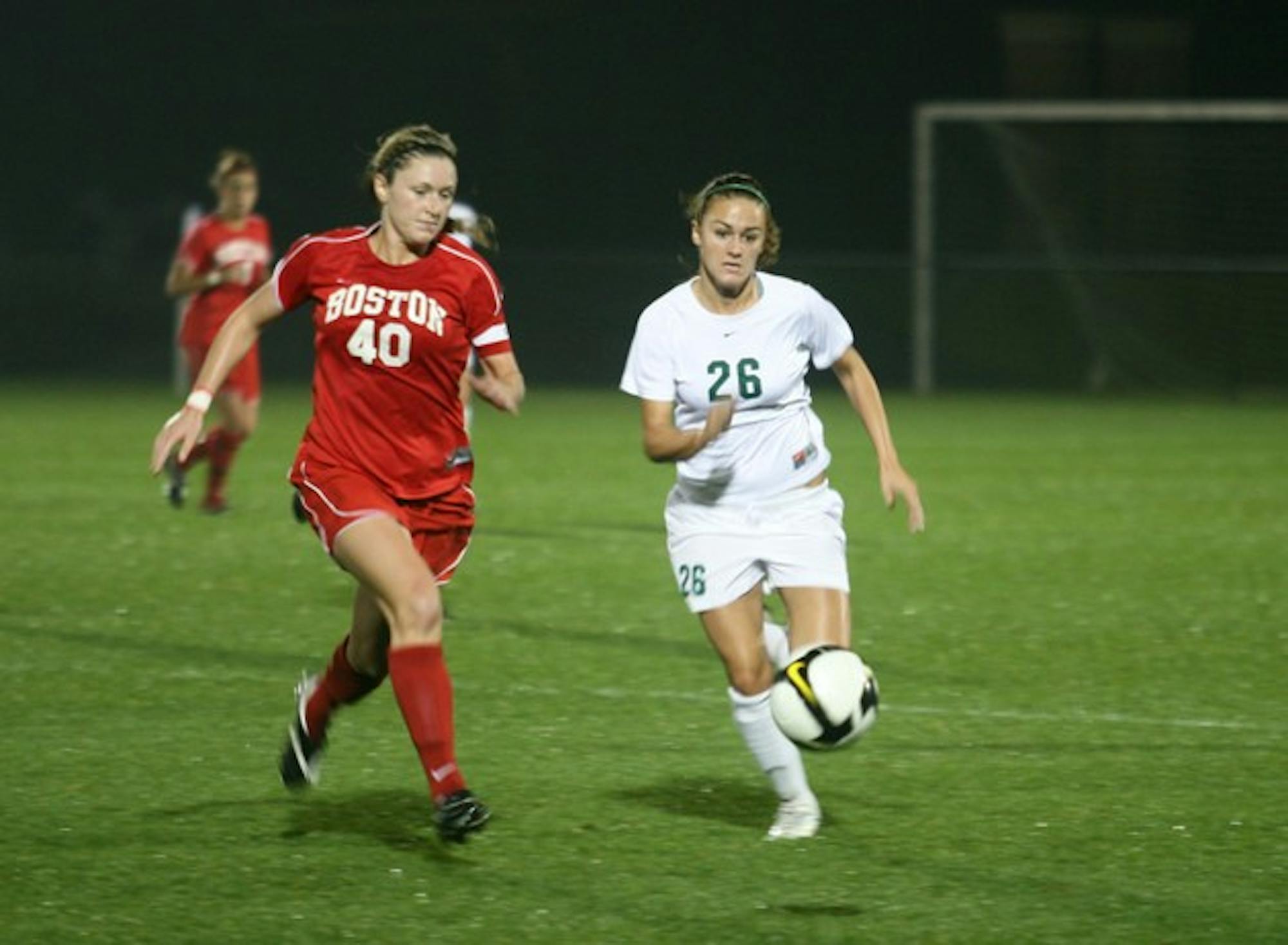 Aly O'Dea '12 chases a loose ball against Boston University, Wedsnesday