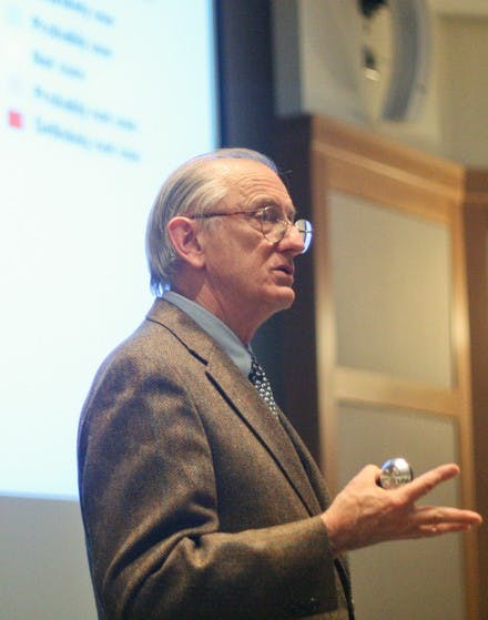 Massachusetts Institute of Technology professor Henry Jacoby proposes an economic approach to reduce climate change at his Thursday lecture.