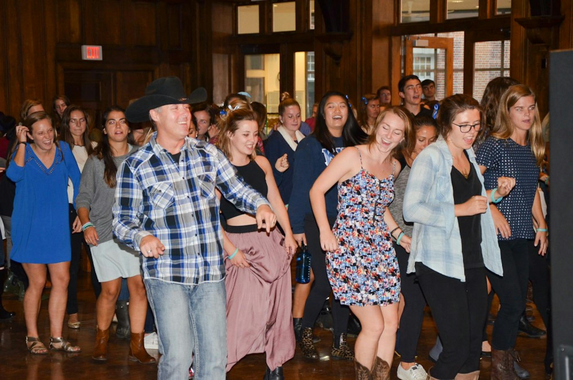 Students line-dance at the memorial service for Summer Hammond ’17, who died in July.