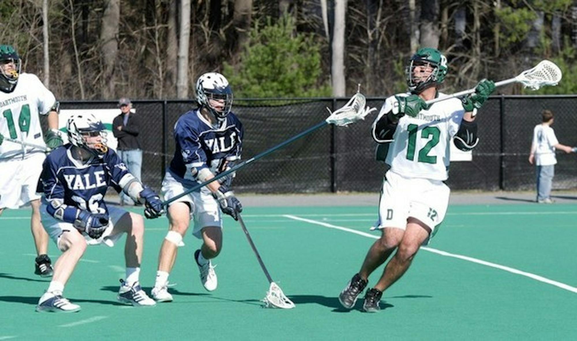 Brad Heritage '06 netted three goals and assisted on another to help the Big Green edge Yale 12-10 Wednesday.