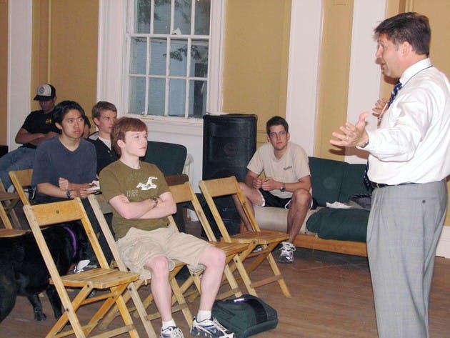 Manchester-based criminal defense lawyer John Kacavas teaches students at Kappa Kappa Kappa fraternity about their rights on Monday evening.