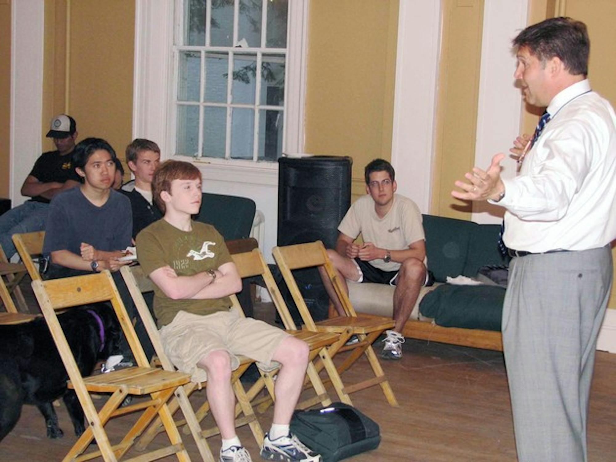 Manchester-based criminal defense lawyer John Kacavas teaches students at Kappa Kappa Kappa fraternity about their rights on Monday evening.