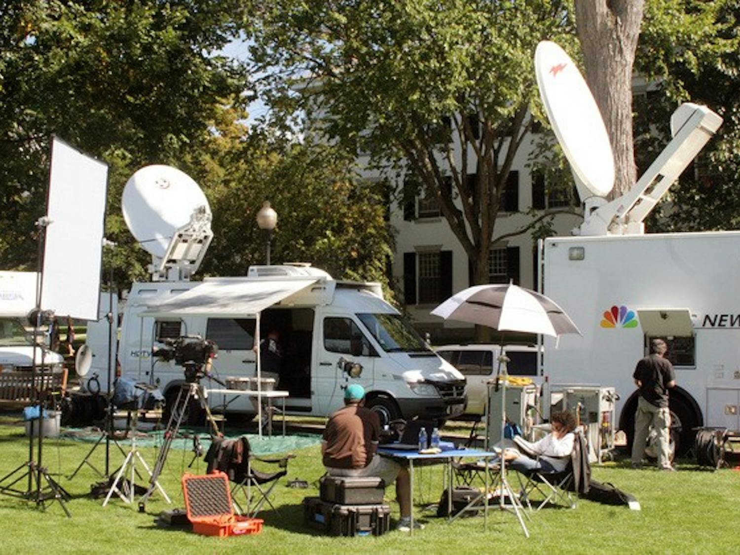 Media trucks line the east side of the Green Tuesday in preparation for Wednesday's presidential debate.