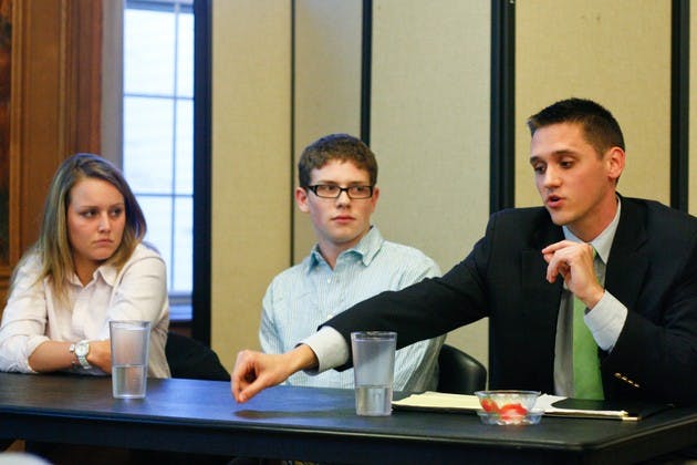 The candidates for student body president participated in a debate sponsored by The Dartmouth in Tindle Lounge on Monday.
