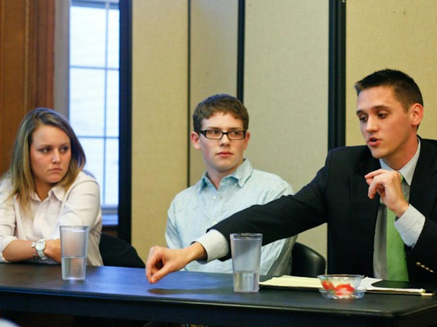 The candidates for student body president participated in a debate sponsored by The Dartmouth in Tindle Lounge on Monday.