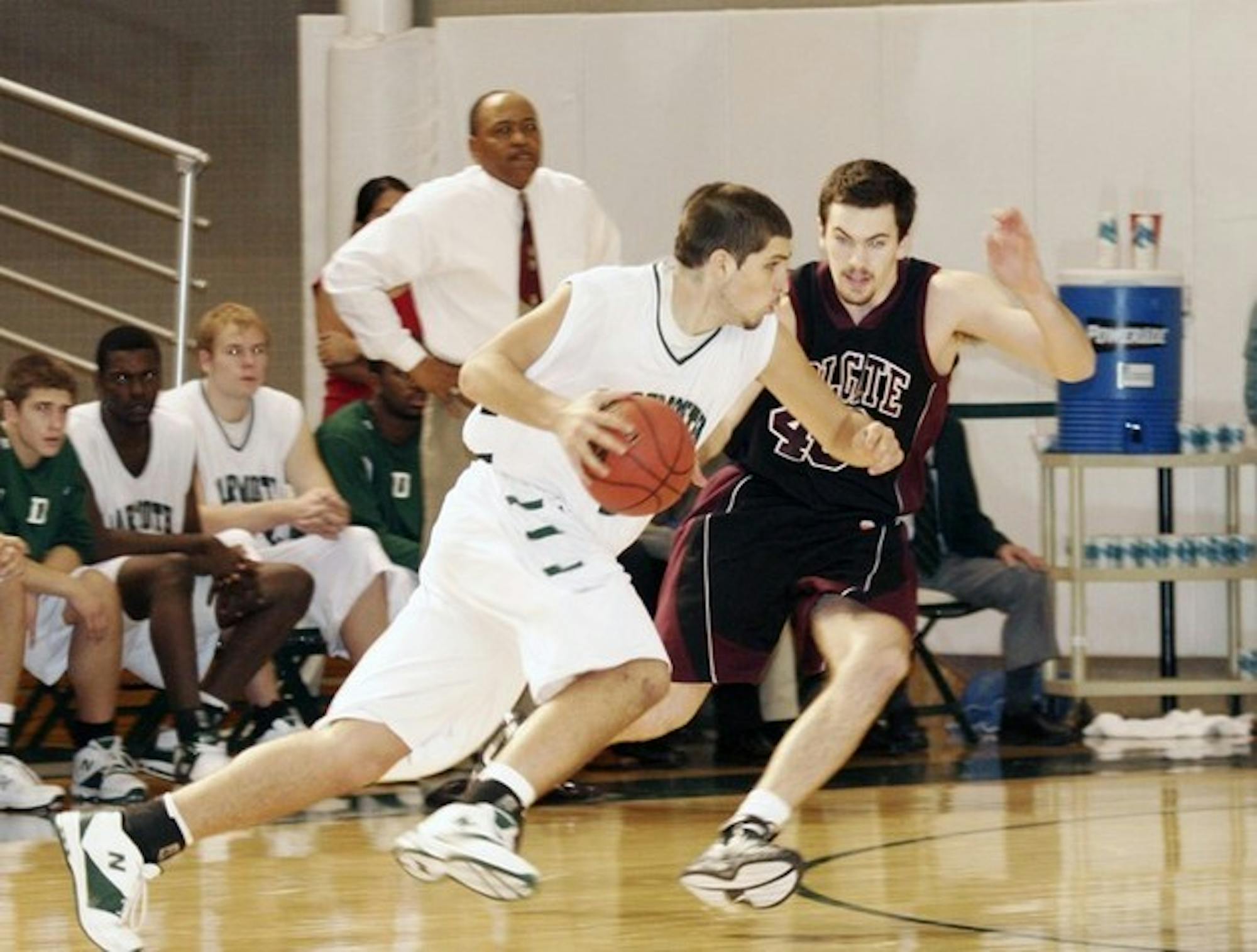 Dan Biber '09 scored four points and pulled down three rebounds in Dartmouth's 55-43 loss to Colgate Saturday.