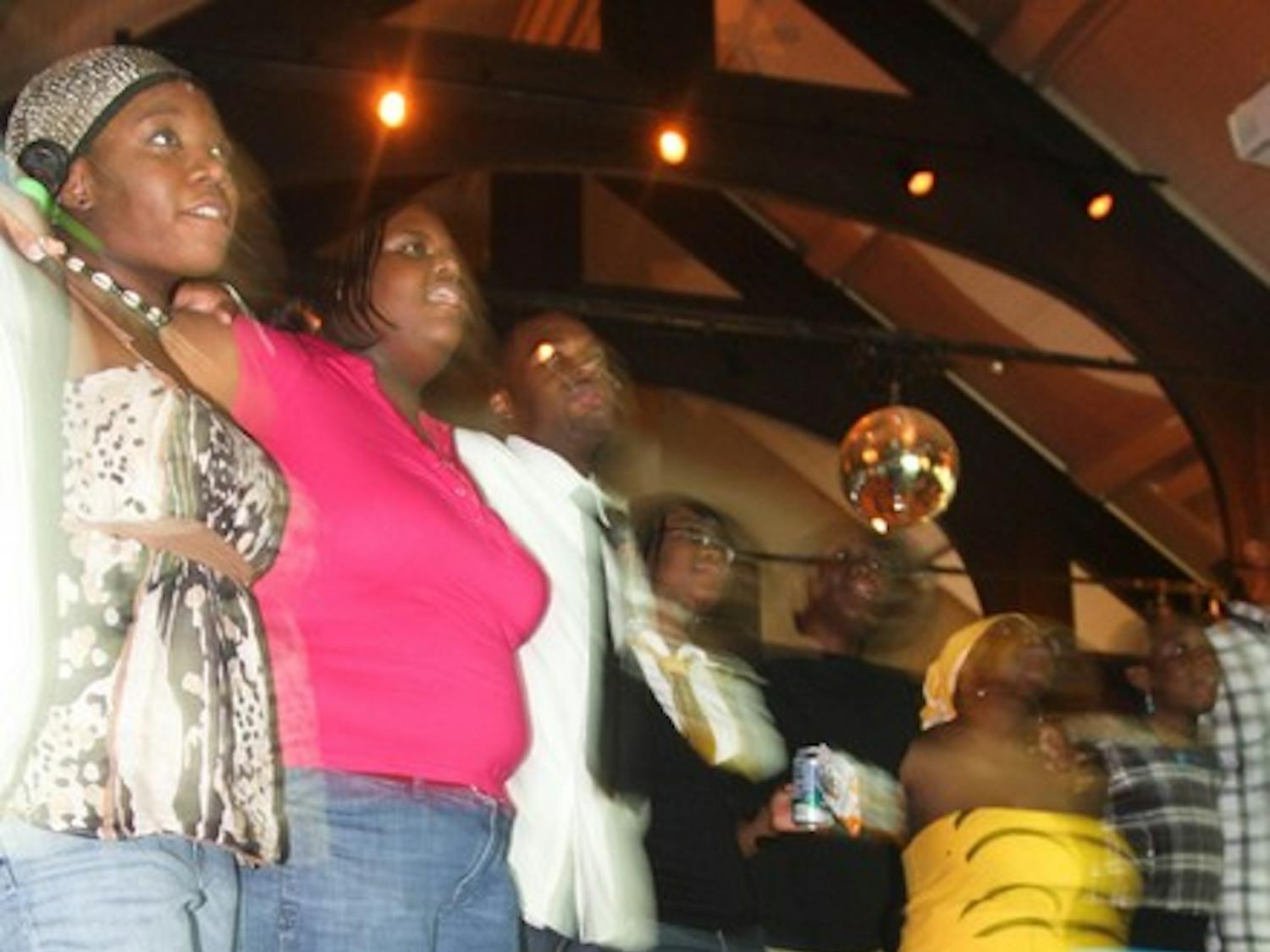 Students celebrate President-elect Barack Obama's Tuesday victory in an Office of Pluralism and Leadership event Sunday in Collis Common Ground.