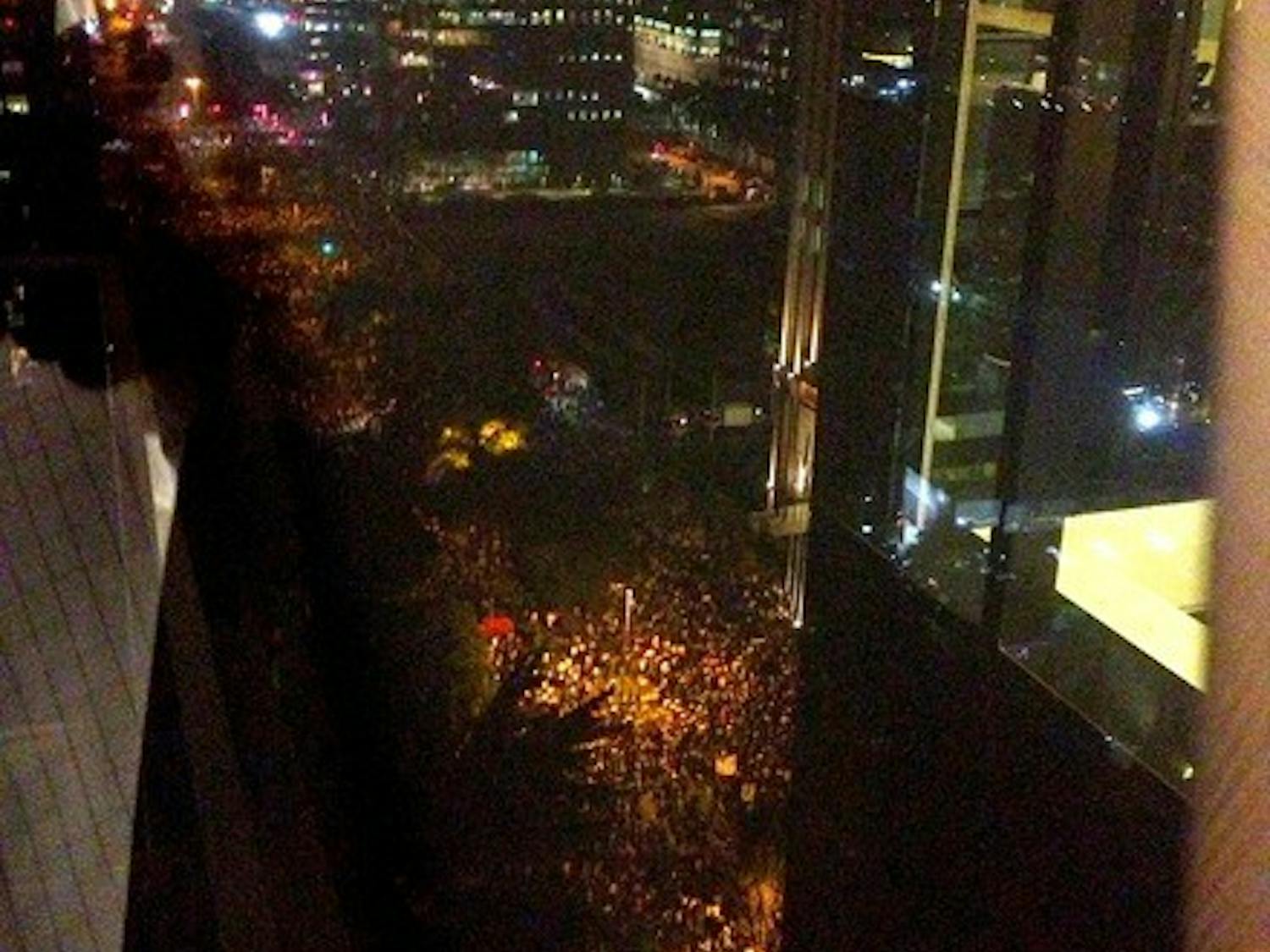 Yamamura watched as 65,000 protestors marched below his window in Sao Paulo, Brazil.