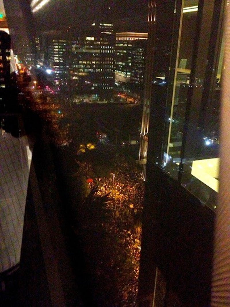 Yamamura watched as 65,000 protestors marched below his window in Sao Paulo, Brazil.
