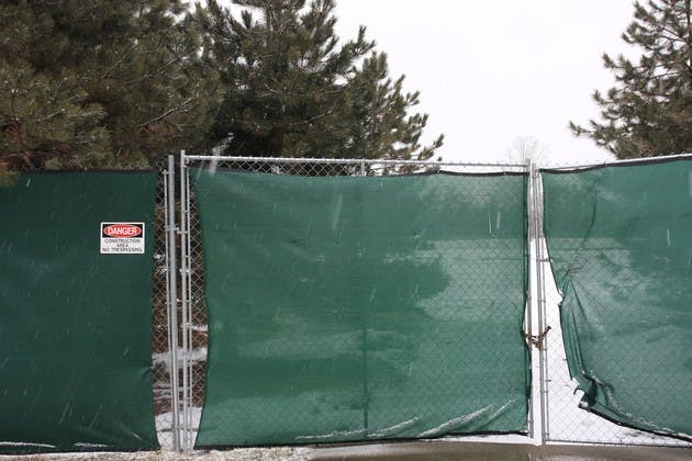 The Occom Pond Neighborhood Association appealed the Town's decision to allow a new College building.