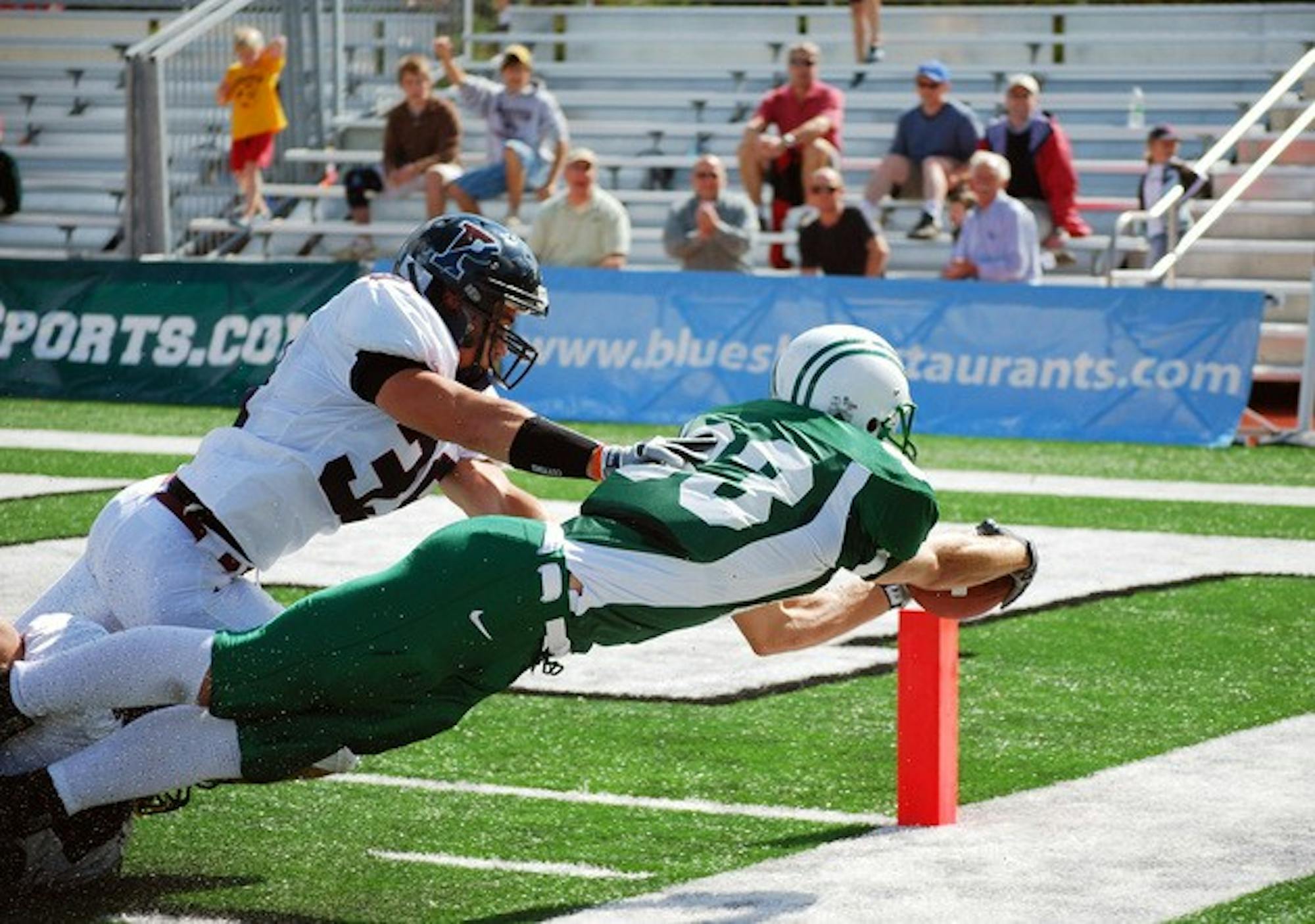 Big Green receiver Eric Paul '09 reaches for the endzone during Dartmouth's dramatic 21-13 win over Penn.