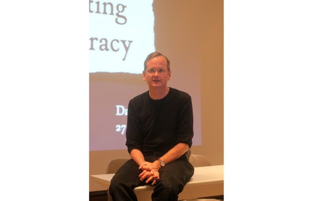 Harvard Law School professor Lawrence Lessig described the influence of lobbyists and campaign donors on public policy.