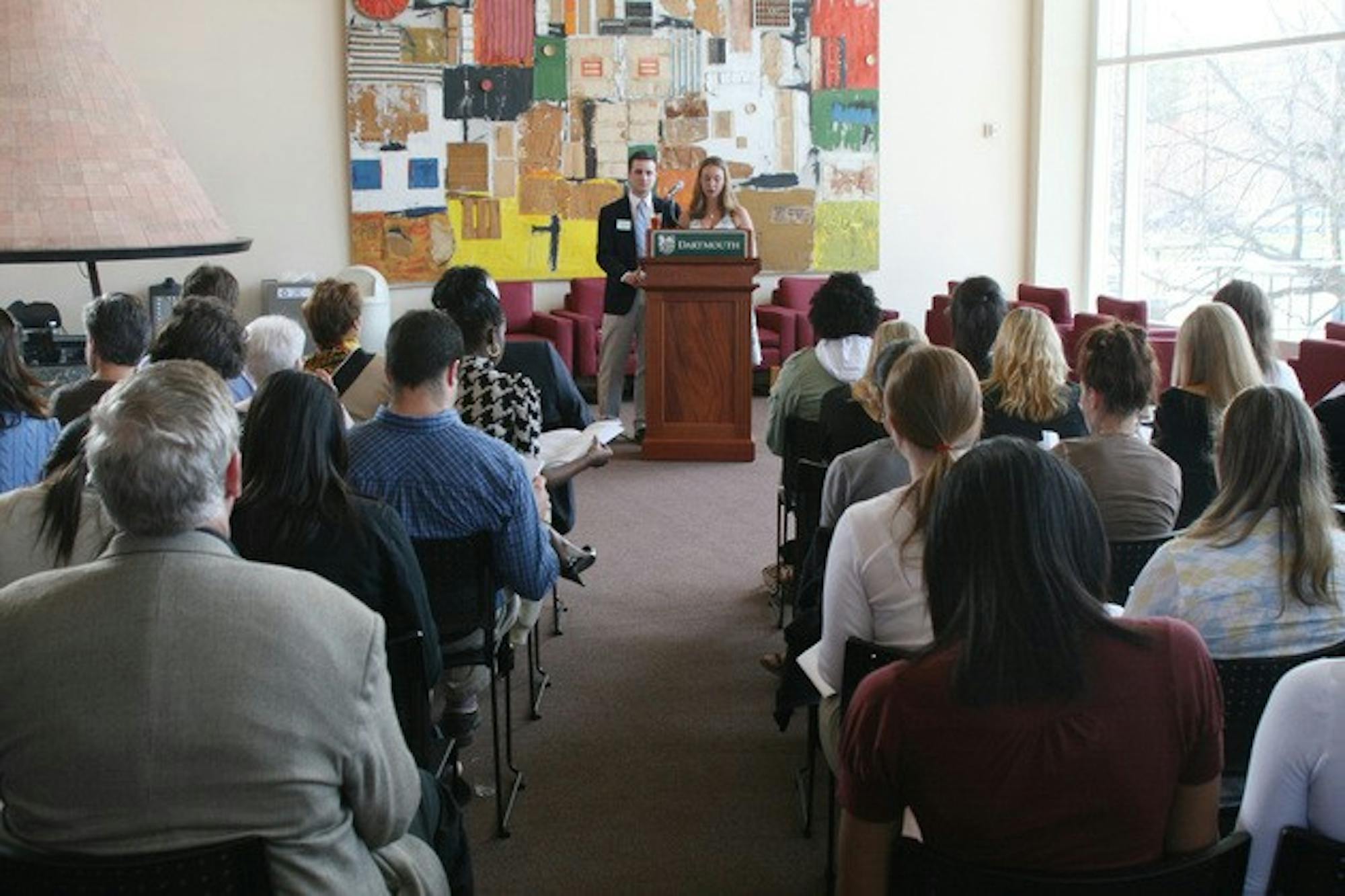 Gregory LaMontagne '07 and Alyssa Scott '07, interns to College President James Wright and Susan Wright, respectively, address a crowd gathered at the Top of the Hop for the College's 10th-annual Academic Gala.