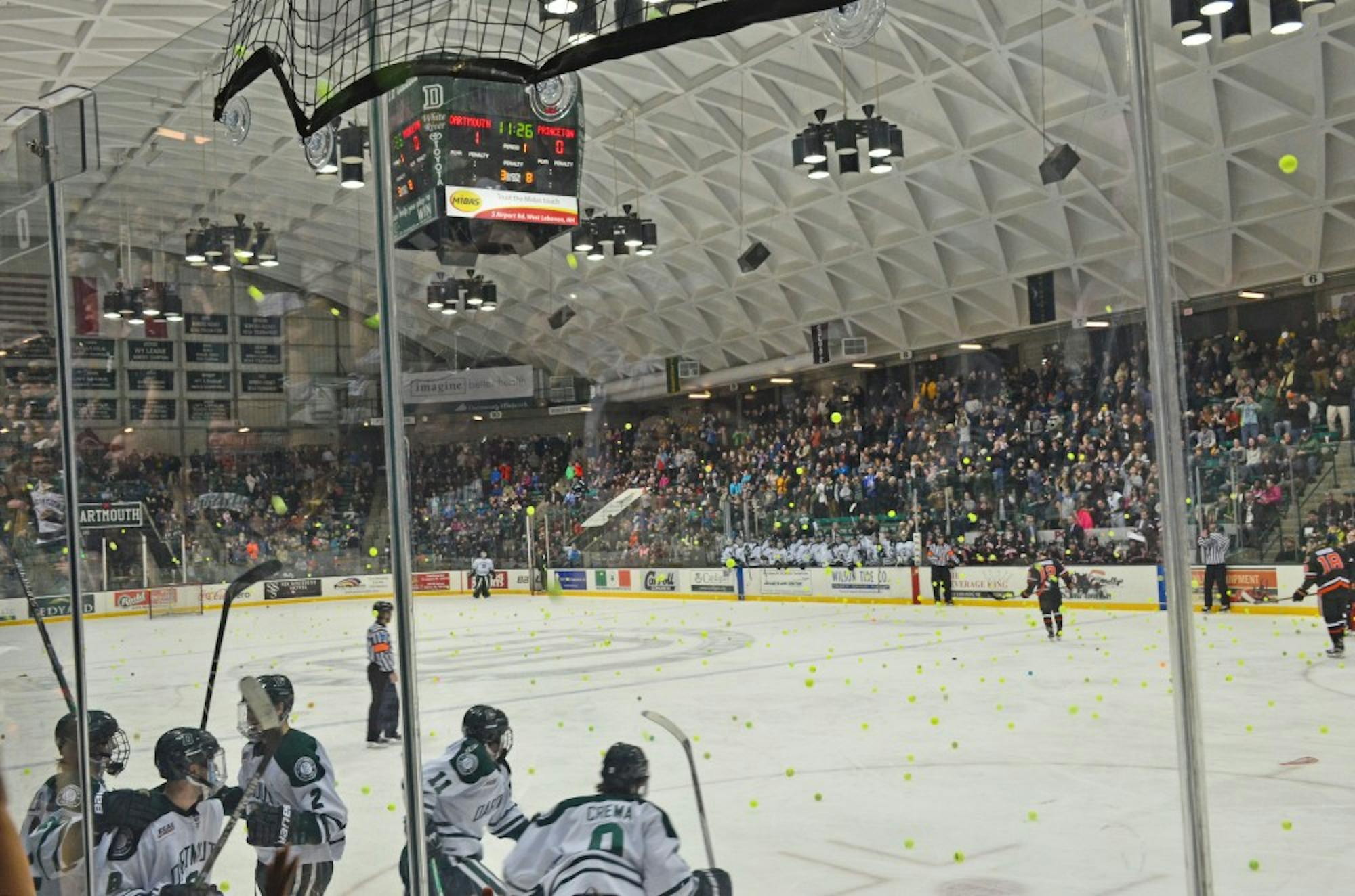 Tennis balls fly after the first goal at the Dartmouth men's hockey game against Princeton on Saturday.