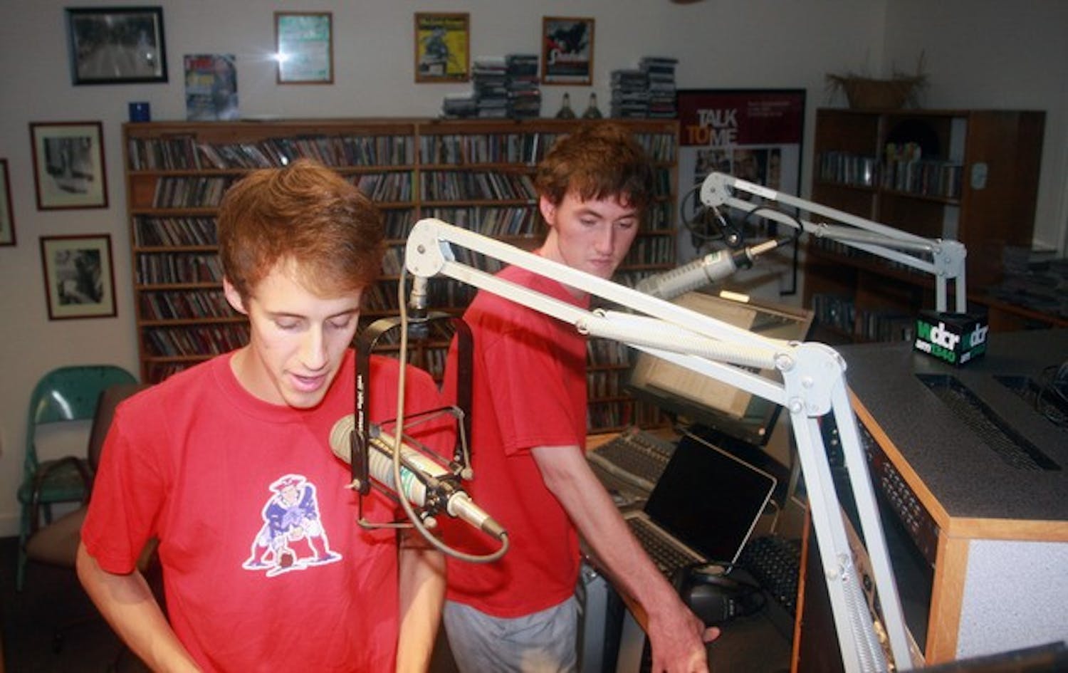 Shane O'Neal '14 and Gil Whalen '14, co-hosts for the Big Green Scene radio show, prepare their latest broadcast. 