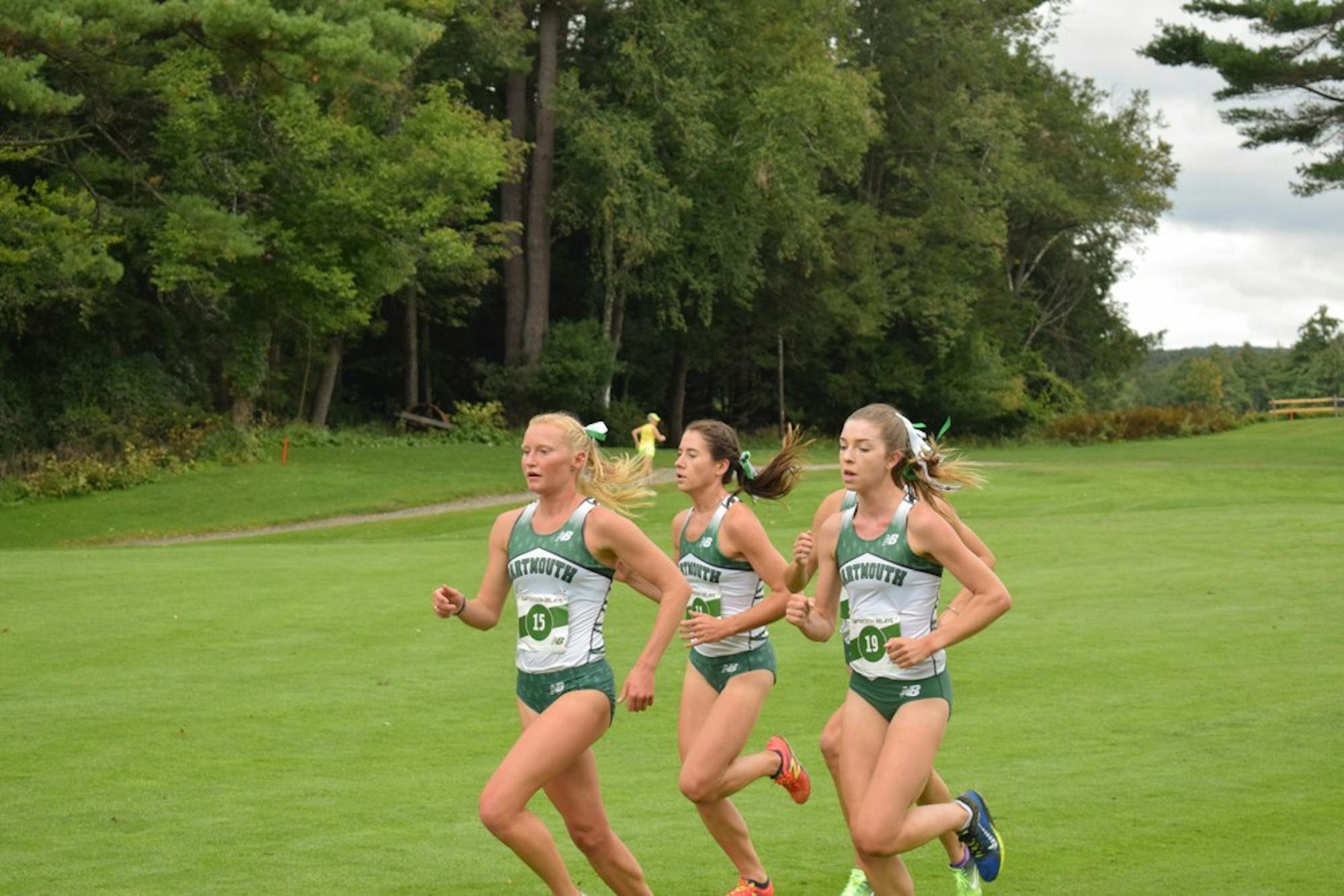 Olivia Lantz ’19 (left) led the field to win the Maribel Sanchez Souther Invitational., completing the 6-kilometer course in 21:33.15.