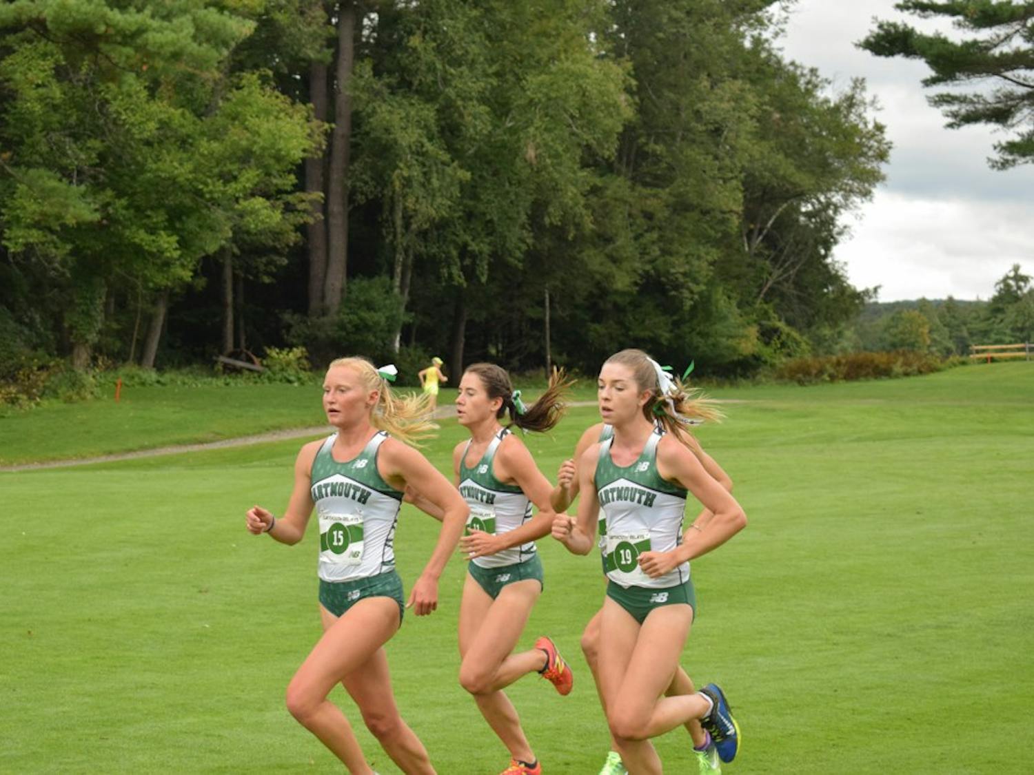 Olivia Lantz ’19 (left) led the field to win the Maribel Sanchez Souther Invitational., completing the 6-kilometer course in 21:33.15.