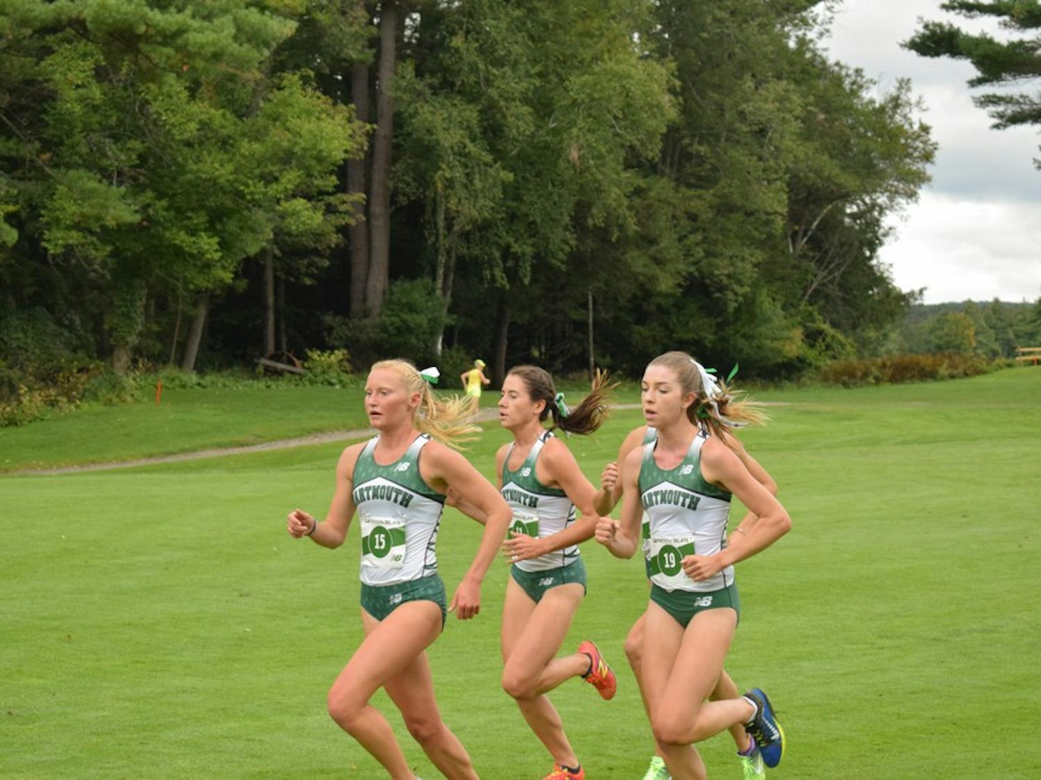 Olivia Lantz ’19 (left) led the field to win the Maribel Sanchez Souther Invitational., completing the 6-kilometer course in 21:33.15.