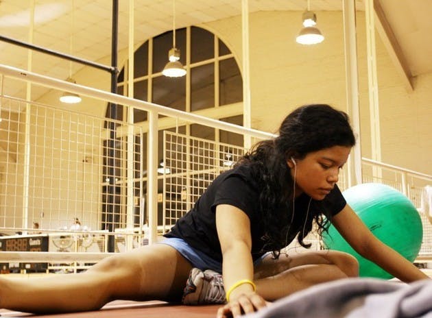 Christina Douglas '07 works out in the temporary fitness center.