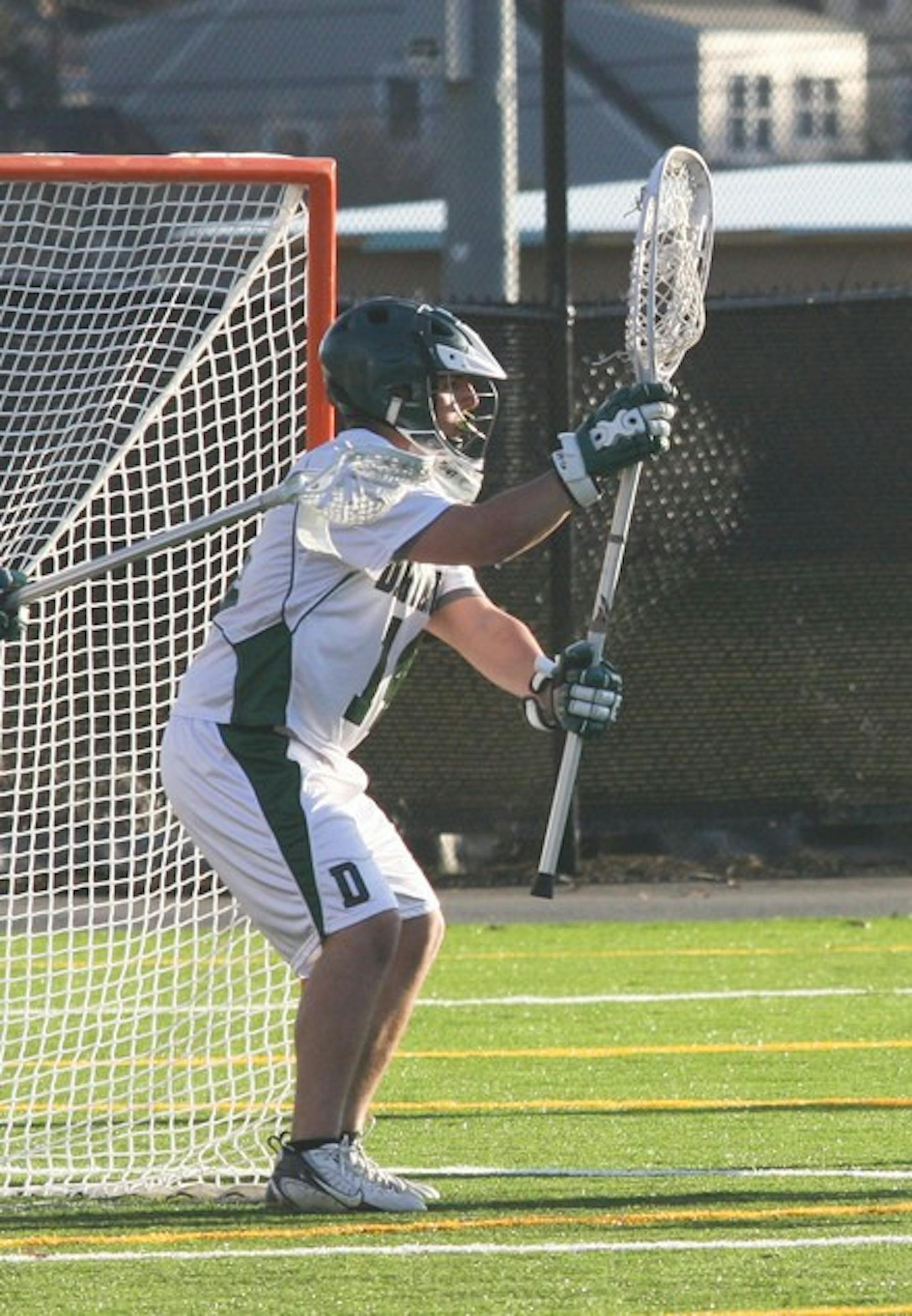 Mike Novosel '10 saved 11 of 24 shots on goal, and men's lacrosse earned its first Ivy League win with a 17-14 victory over Yale Wednesday afternoon.