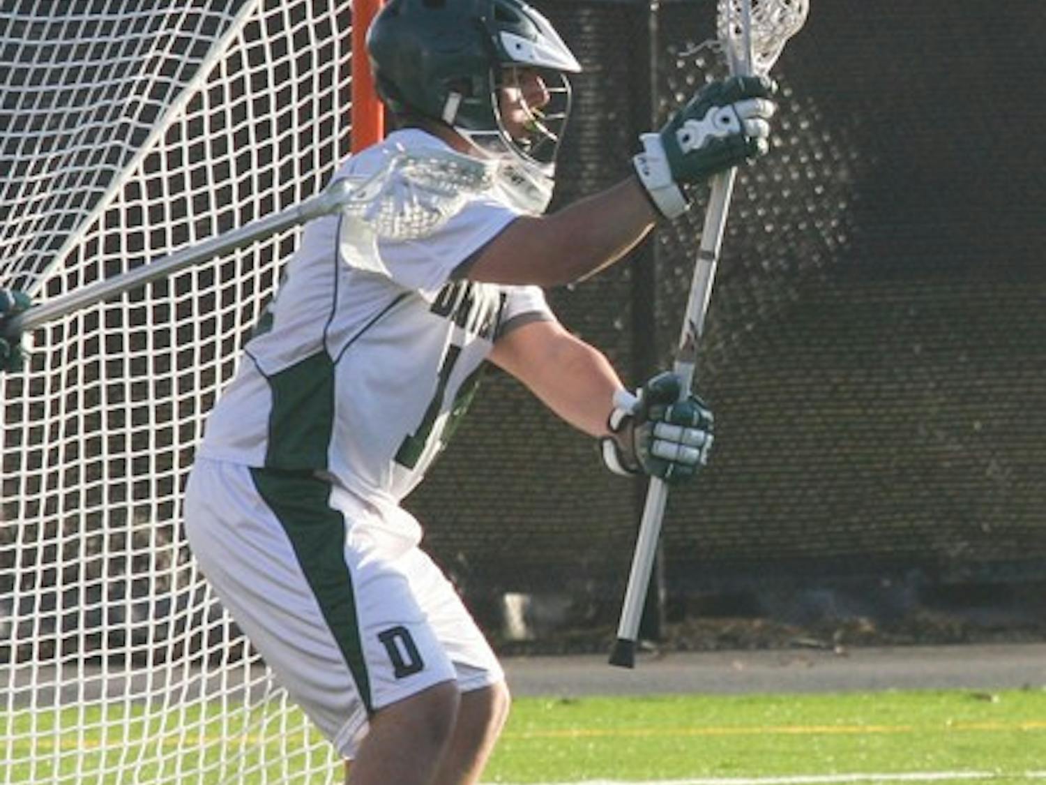Mike Novosel '10 saved 11 of 24 shots on goal, and men's lacrosse earned its first Ivy League win with a 17-14 victory over Yale Wednesday afternoon.