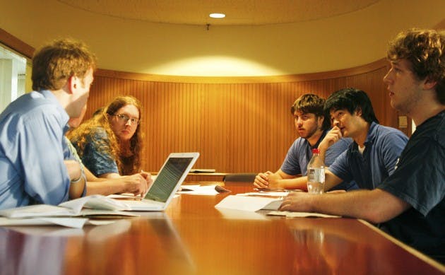 Dartmouth College Democrats discuss plans for their fall strategy in Morrison Commons.