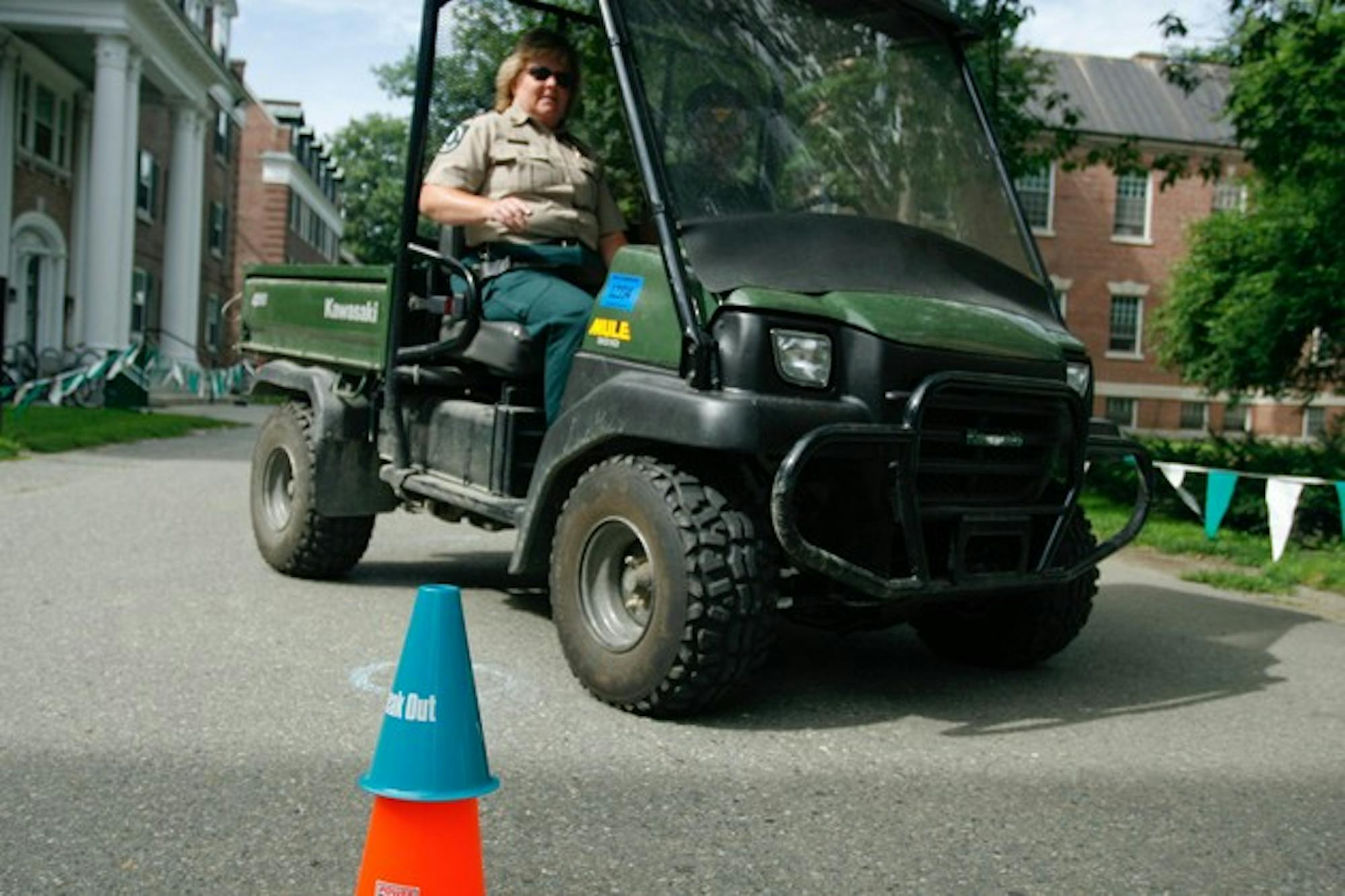 Onyinyechukwu Kanu '09 drives while wearing beer goggles through an obstacle course on Massachusetts Row during the DAPA sponsored event.