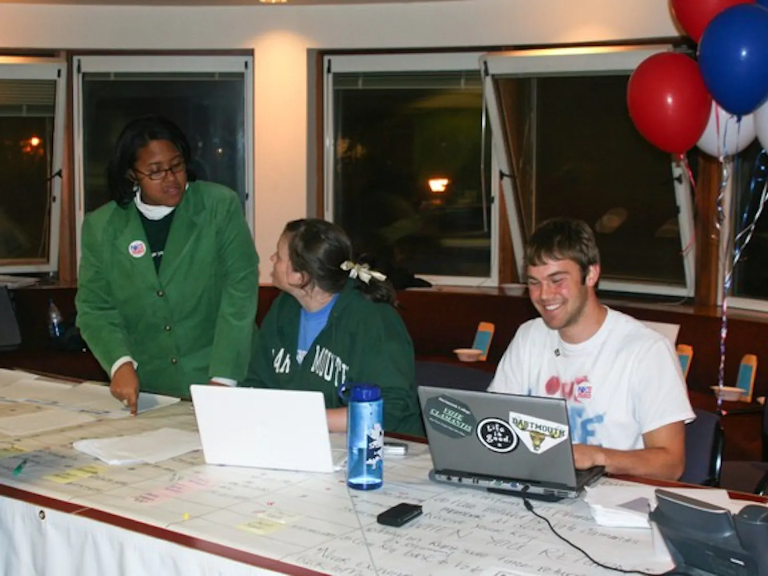 Jessica Guthrie '10, Myra Altman '11 and Justin Varilek '11 organize volunteers at the Vote Clamantis Election Day headquarters in the Rockefeller Center.
