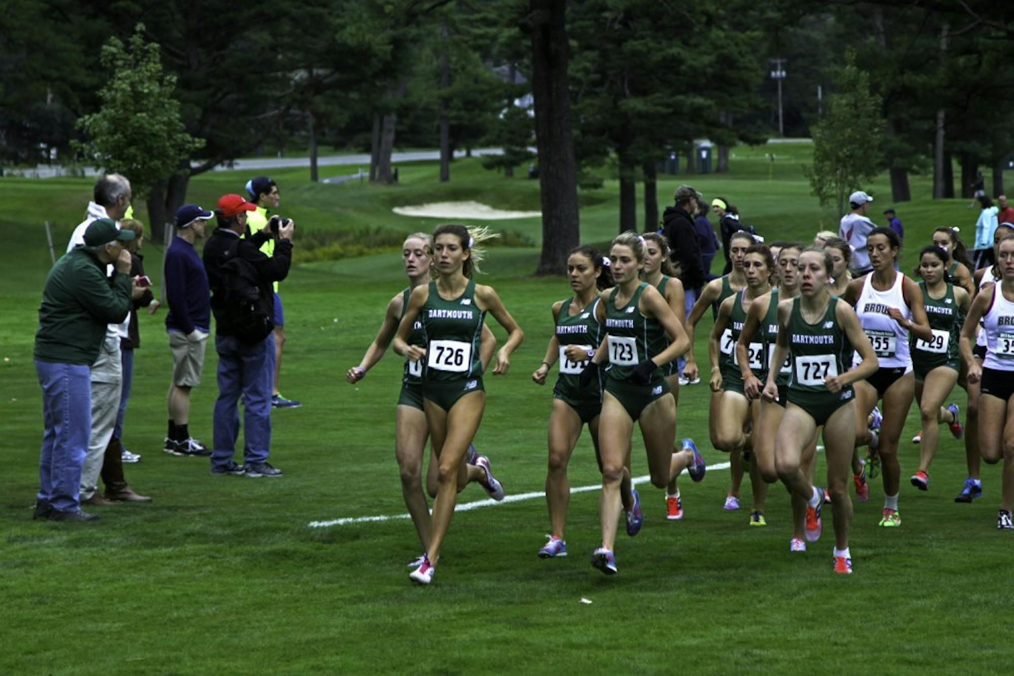Dana Giordano ’16 leads a pack of Big Green runners at the Dartmouth Invitational earlier this fall. Dartmouth took first place.