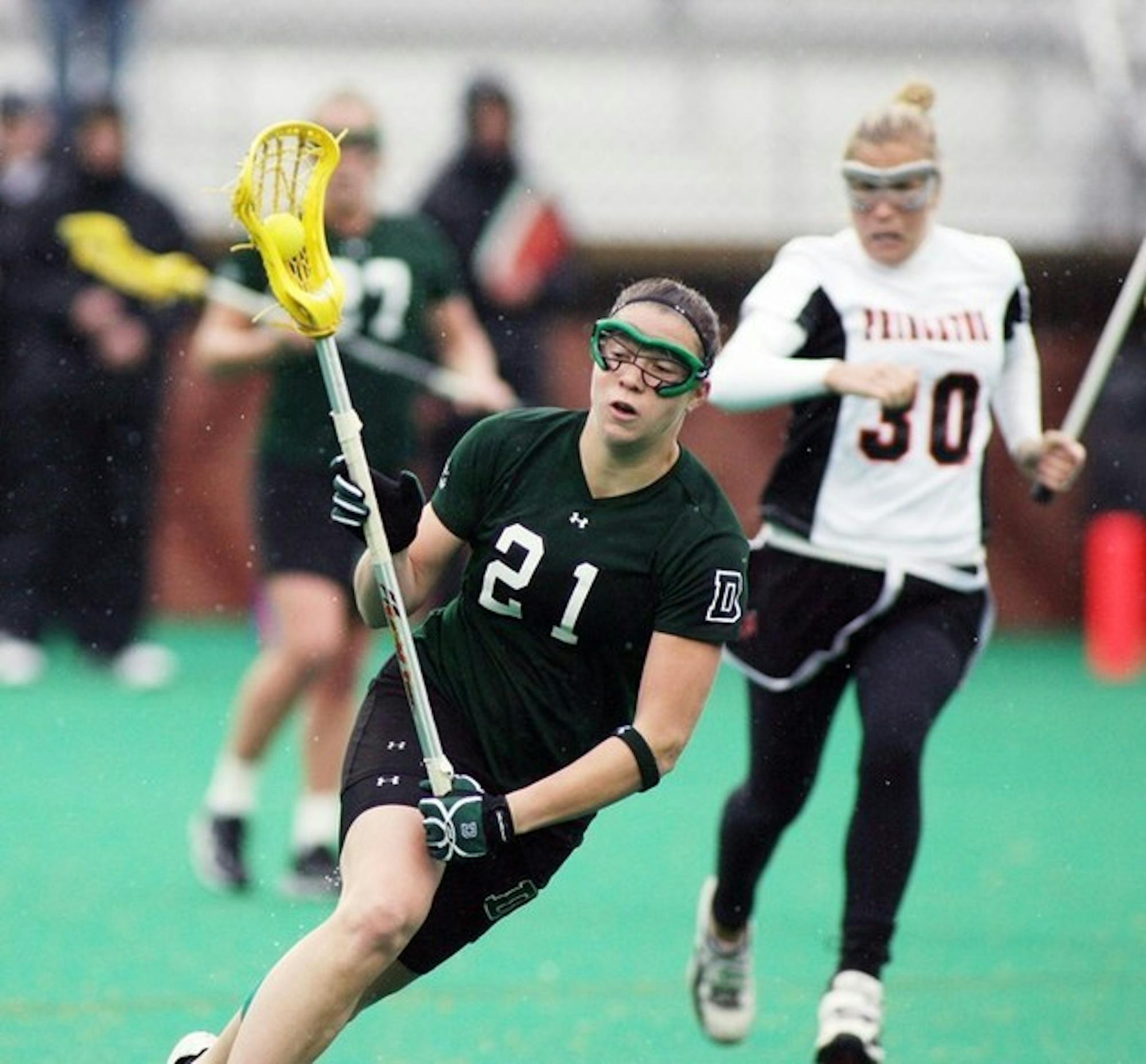 Rainy conditions could not slow down Jen Pittman '07's stellar play of late. The junior netted four goals on Saturday.