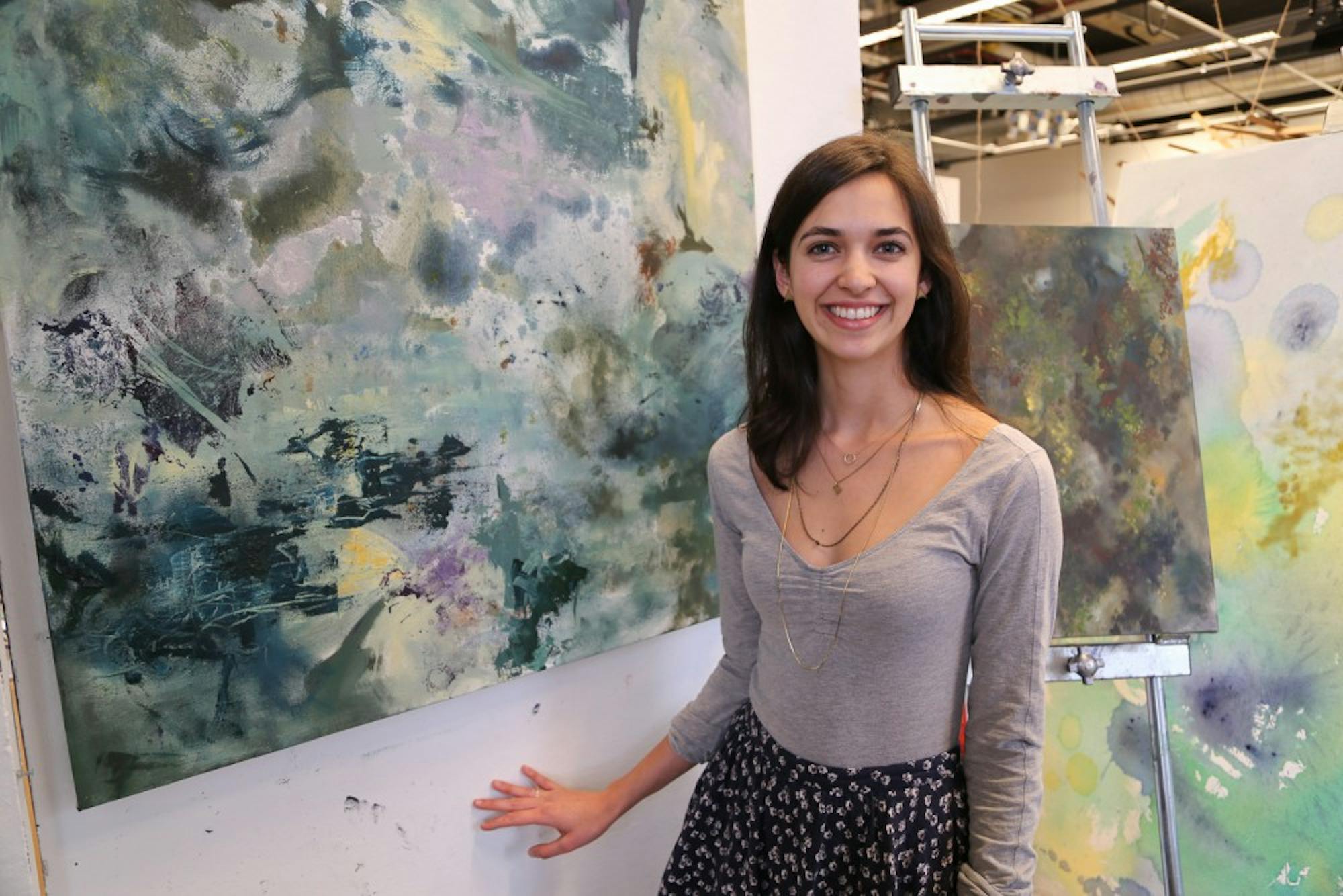 Dorn is working on a senior thesis, which includes a series of large canvasses.