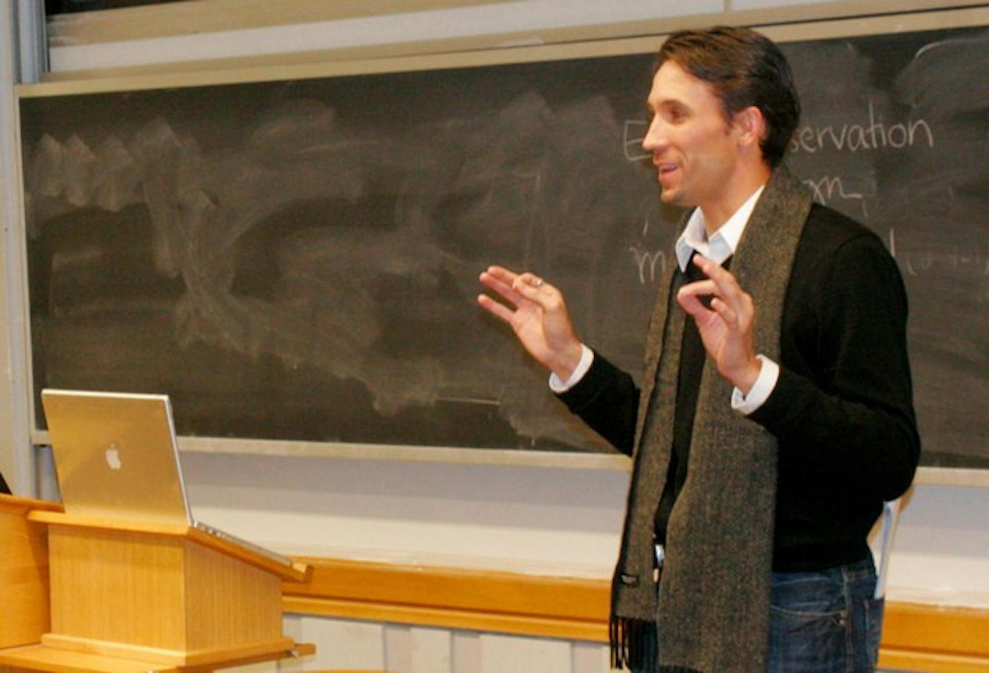 Tadd Kruse, an assistant dean at the American University of Kuwait, speaks at a Student Assembly meeting.