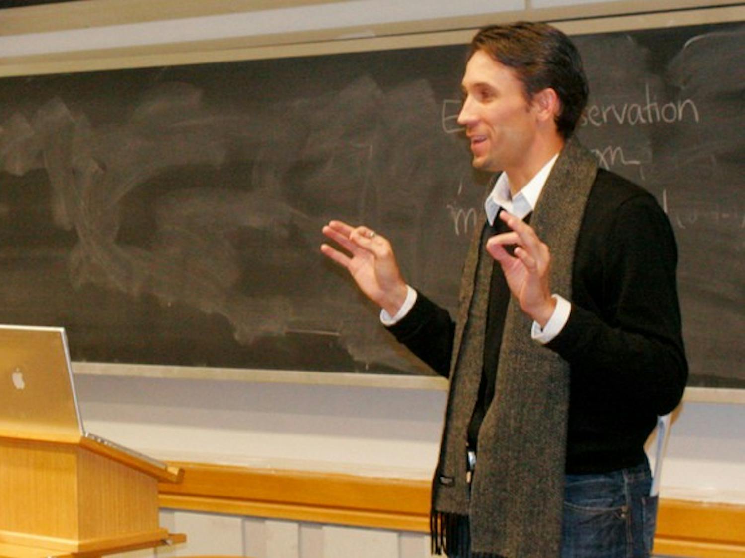 Tadd Kruse, an assistant dean at the American University of Kuwait, speaks at a Student Assembly meeting.