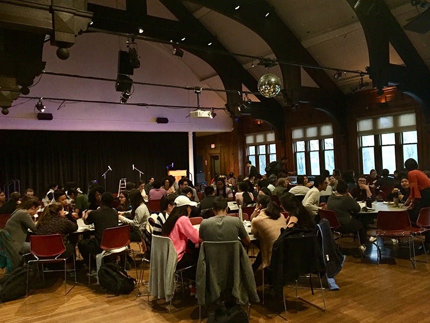 Student convene in Collis Commonground for the Intercommunity Dinner.