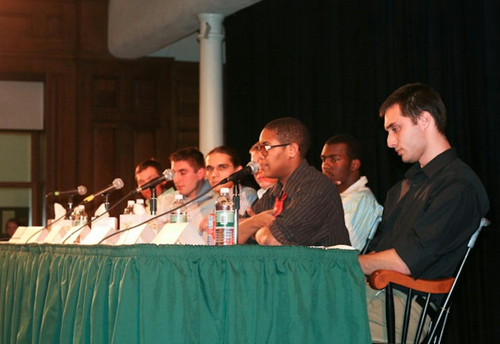 Seven undergraduate men discuss their life experiences at the 