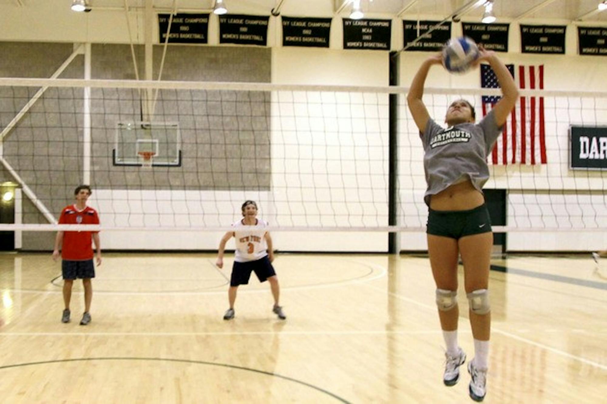 Tim Connor '13 prepares to get spiked in the face. Jonathan Katz '12 watches.